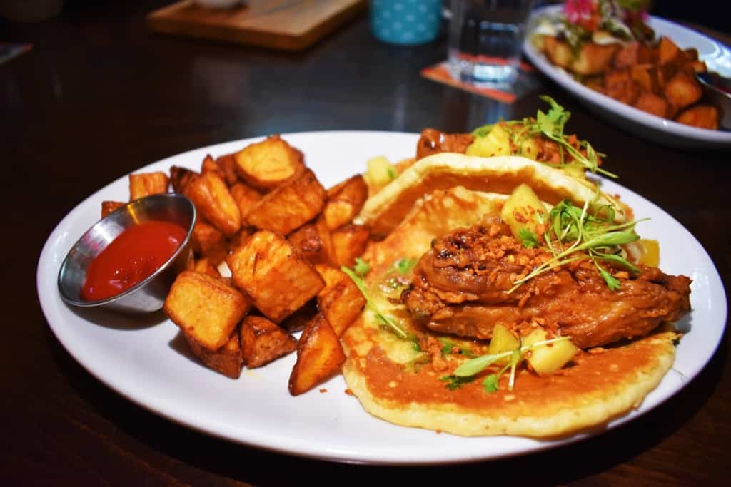 Fried Chicken Pancake Tacos makes for delicious global dining at Tribe Street Kitchen.