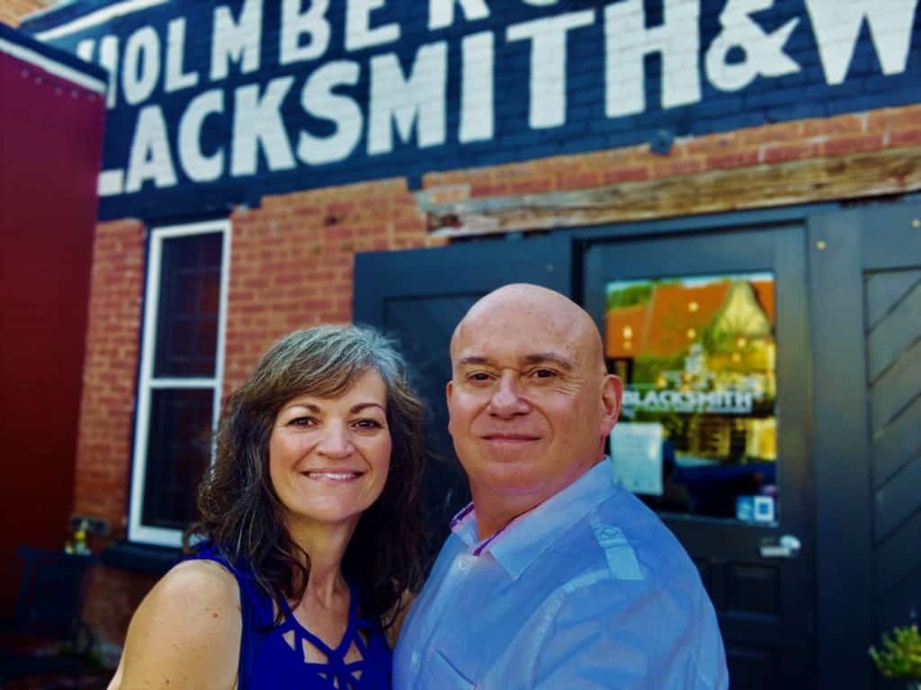 The authors pose for a selfie outside Blacksmith Coffee. 