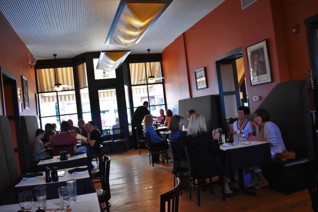 Visitors catch up with friends and family at L. May eatery, a Dubuque social hot spot. 