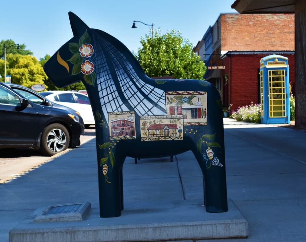 A Dala horse stands at attention along Main Street in Lindsborg, Kansas. 