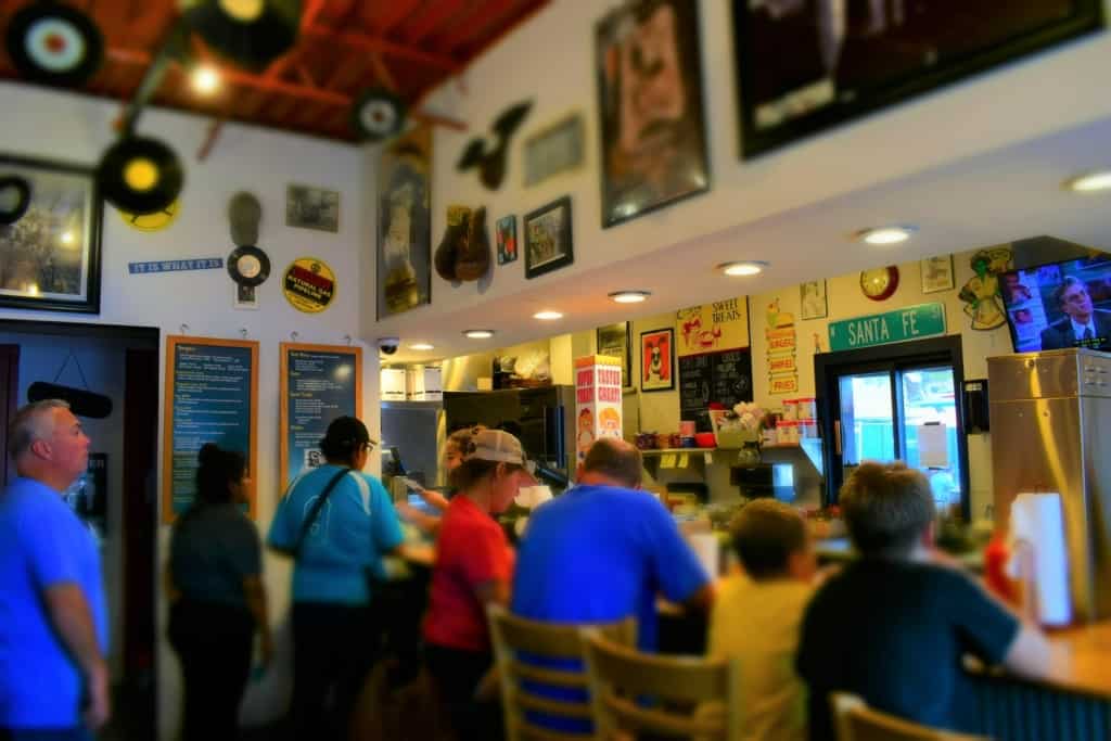 The tight space at The Snack Shack on Santa Fe can become filled with hungry diners on any given day. 