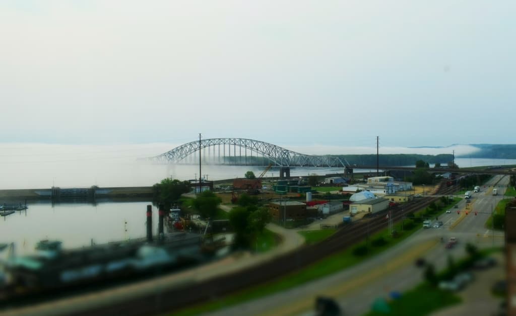 An early morning fog rolls over the Mississippi River in the port of Dubuque. 