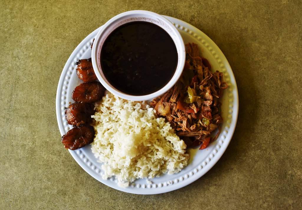 A tempting plate of Cuban food is awaiting visitors to Chips & Coins in KCK.