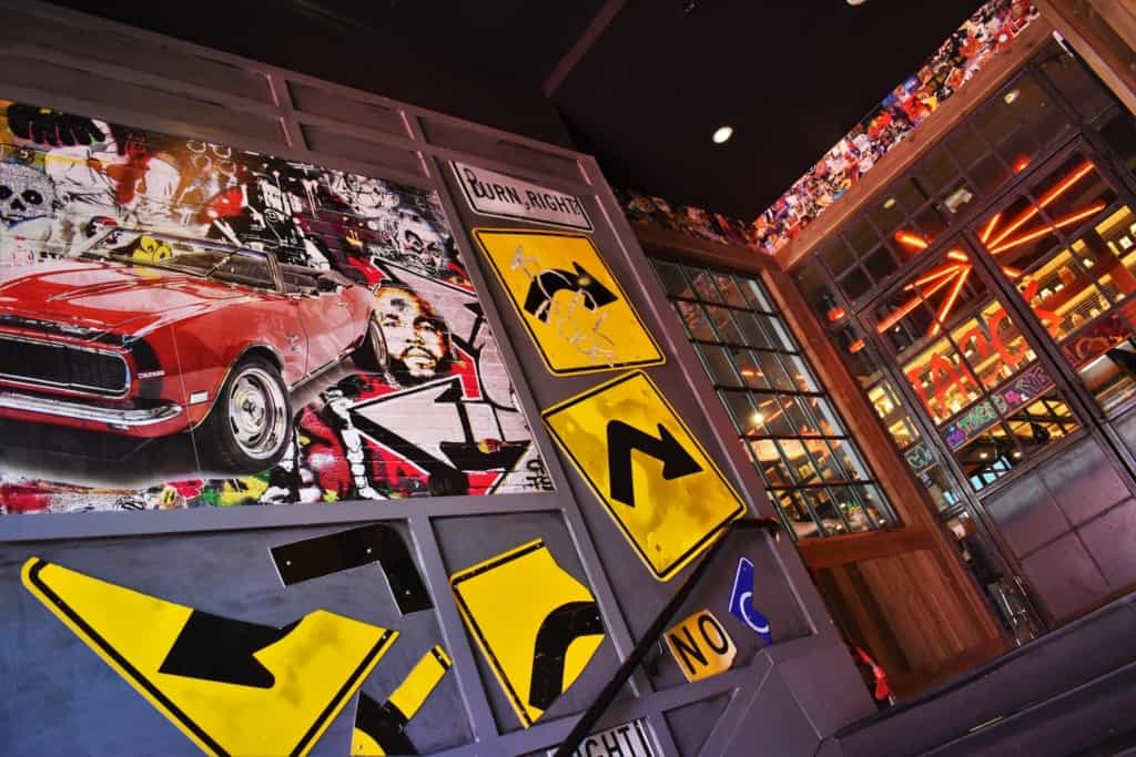 Guy Fieri's iconic red Camaro can been seen pictured in a mural at the entrance to his Kansas City restaurant.