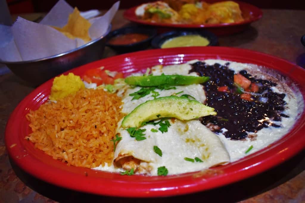 The cream Cheese Chicken Enchilada plate is filled with color and flavor. 