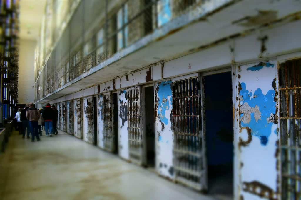 Walking the block at the Missouri State penitentiary included a view of the cells that once housed five prisoners each.