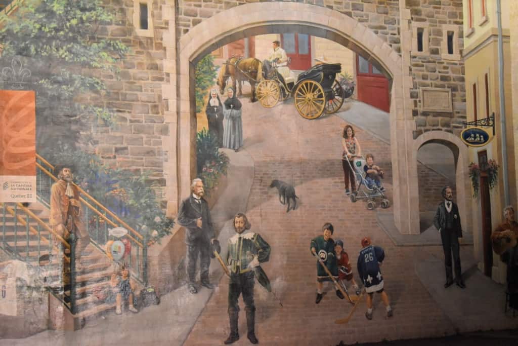 Notable characters are accounted for in this mural near Place Royale. 