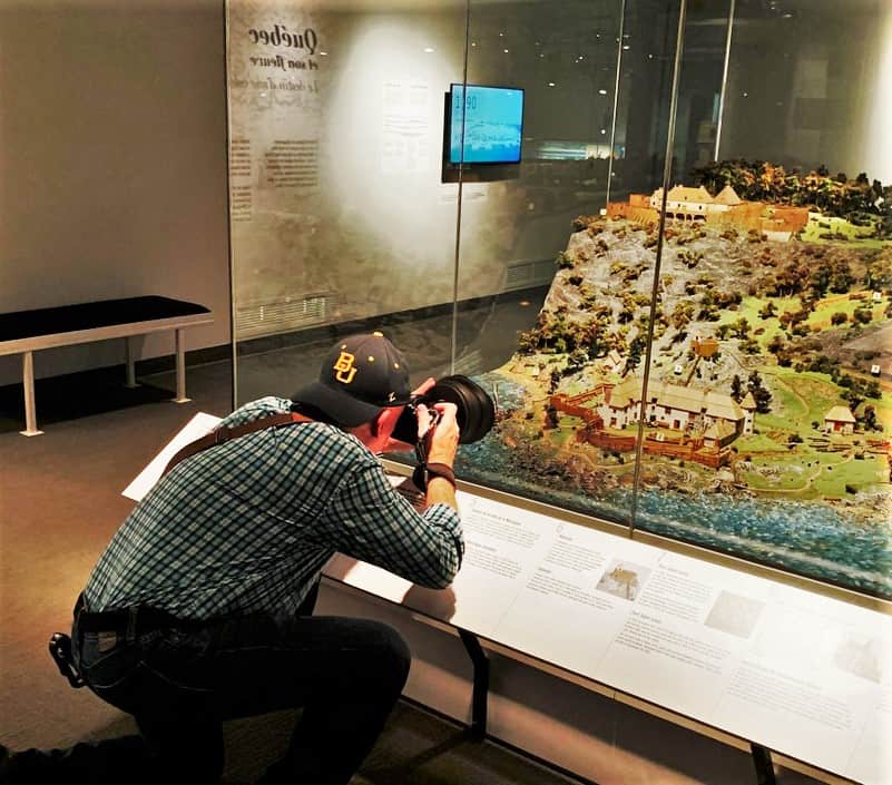 The author uses various techniques, while capturing history for an article.