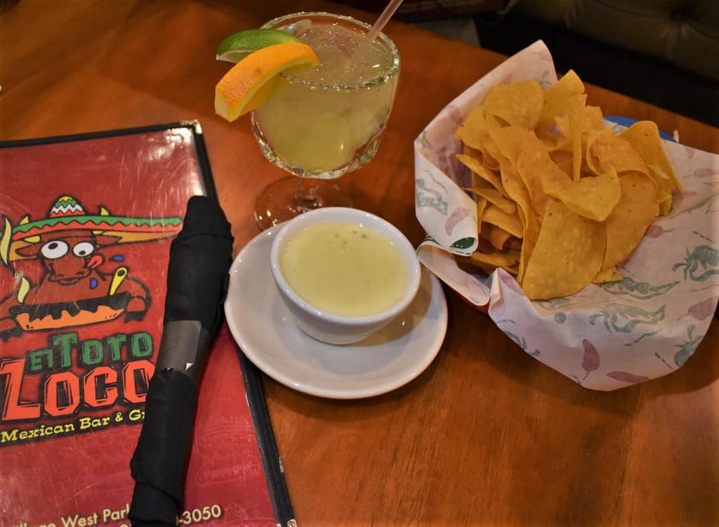 An evening of dining at El Toro Loco included queso dip, tortilla chips, and a house margarita.
