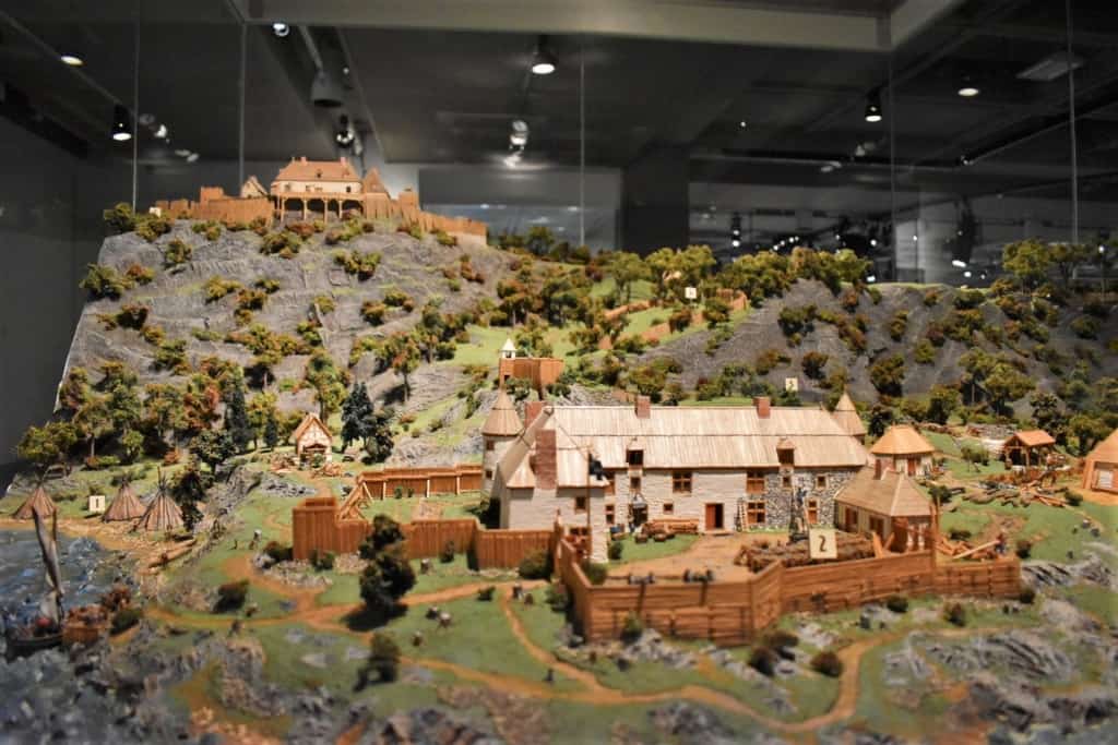 A diorama of an early Quebec City helps visitors during their task of capturing history.