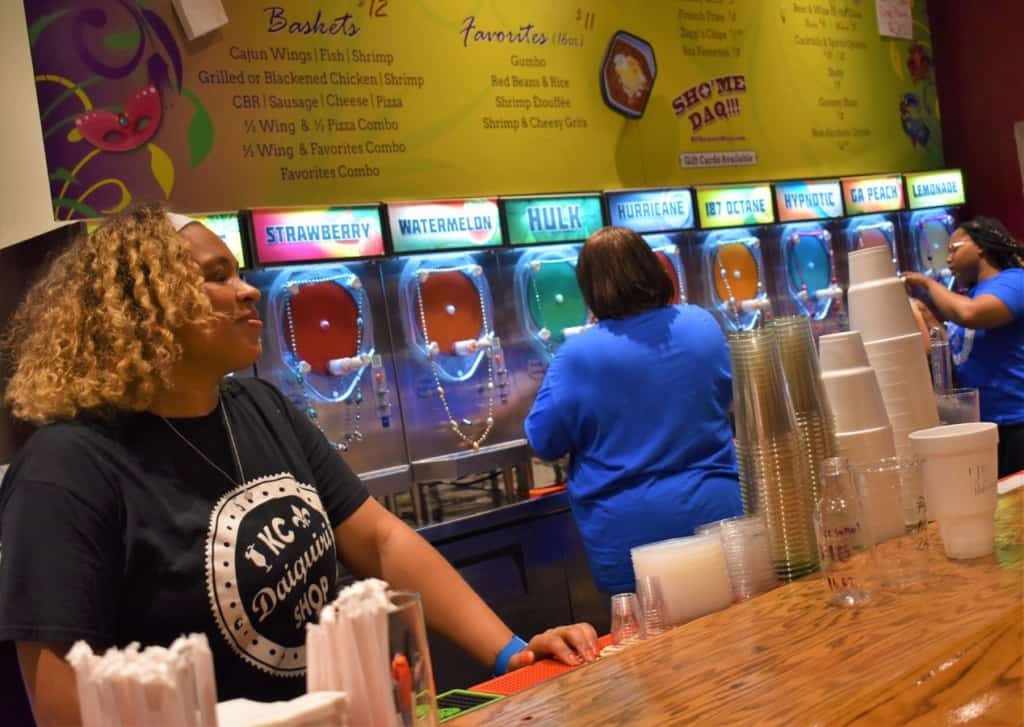 Colorful mixes are doled out to eager customers at KC Daiquiri Shop. 