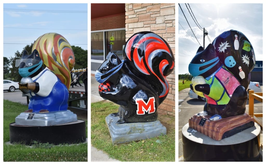 Three of the colorful black squirrel statues that can be found scattered around Marysville. 