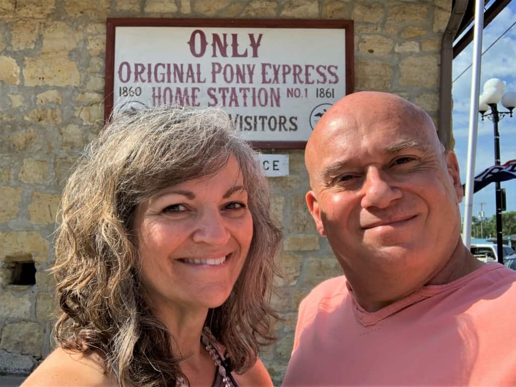 The authors pause for a selfie outside the Pony Express Barn Museum.