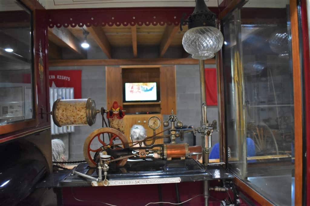 An old-fashioned popcorn maker frames the short film explaining the purpose of the Pony Express Barn Museum.