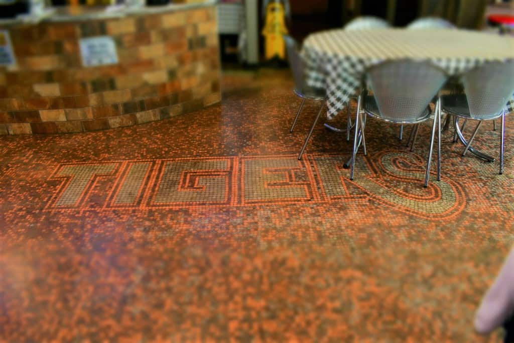 The coin embedded floor at Tiger Burgers had us looking for iconic phrases.