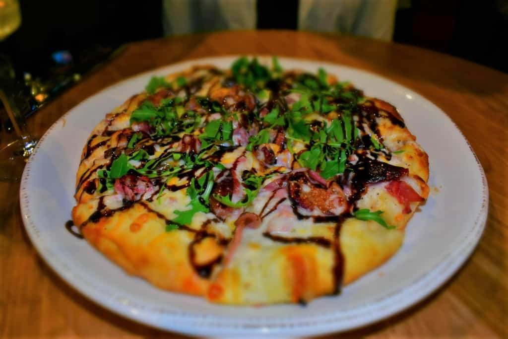 The Fig & Prosciutto Pizza has a mighty combination of flavors. 