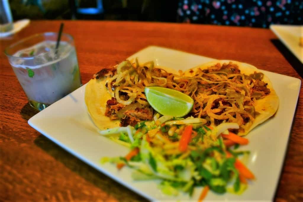 The Pulled Pork Tacos were filled with flavorful meat and crispy onions. 