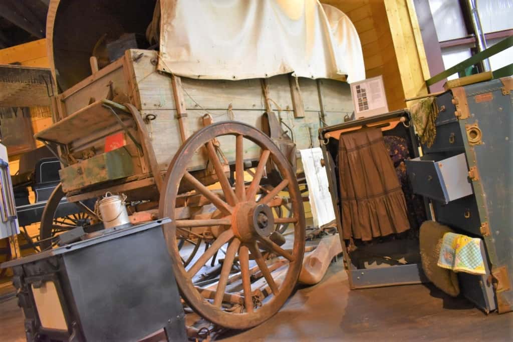 Pioneers traveled westward in covered wagons to reach the Nebraska frontier. 