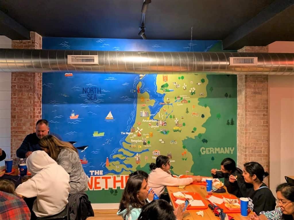 The interior mural helps showcase the country of the Netherlands. 