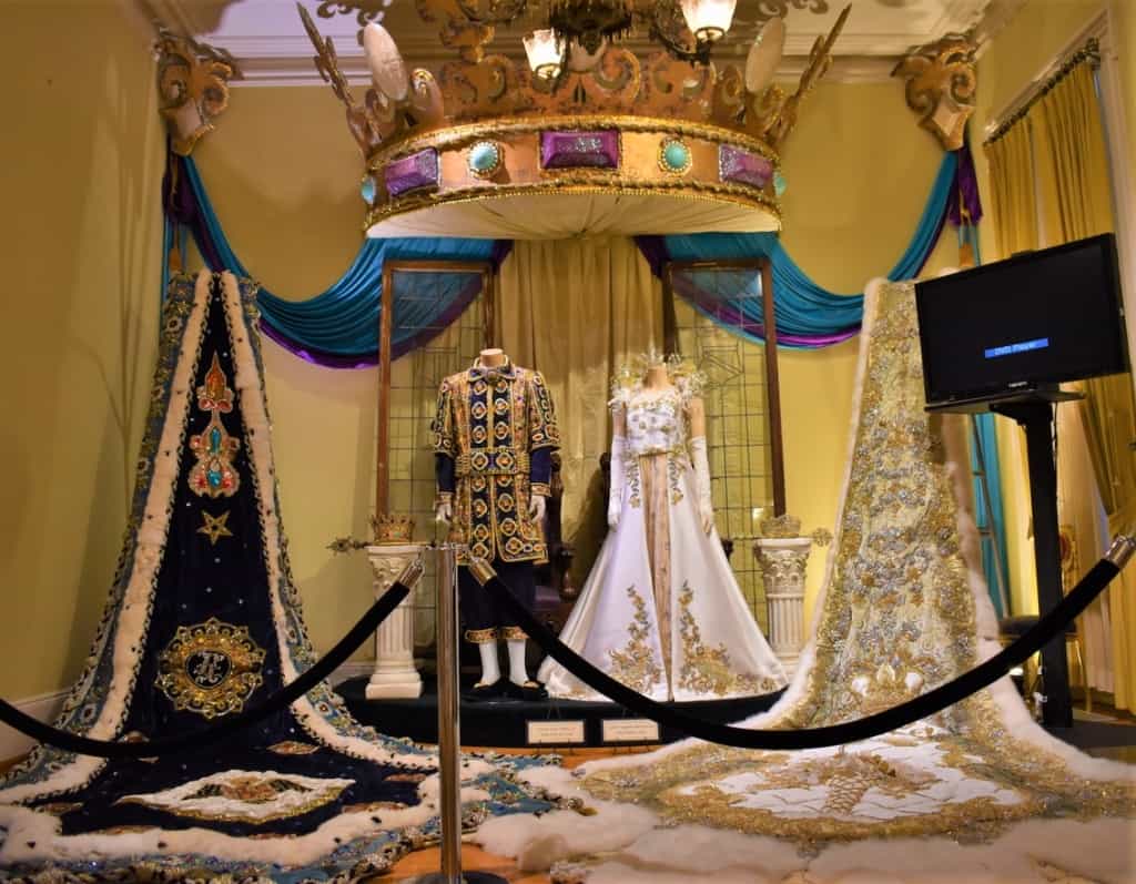 The regalia of the formal balls is represented in some of the galleries. 