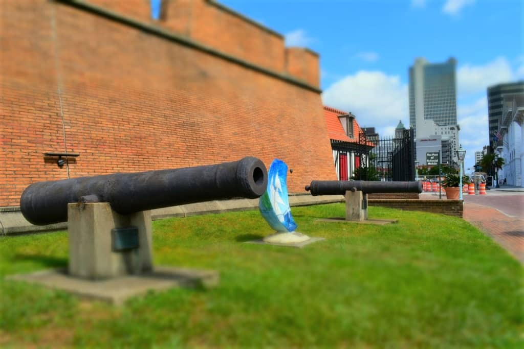 Old cannons sit silent outside the walls of Fort Conde. 