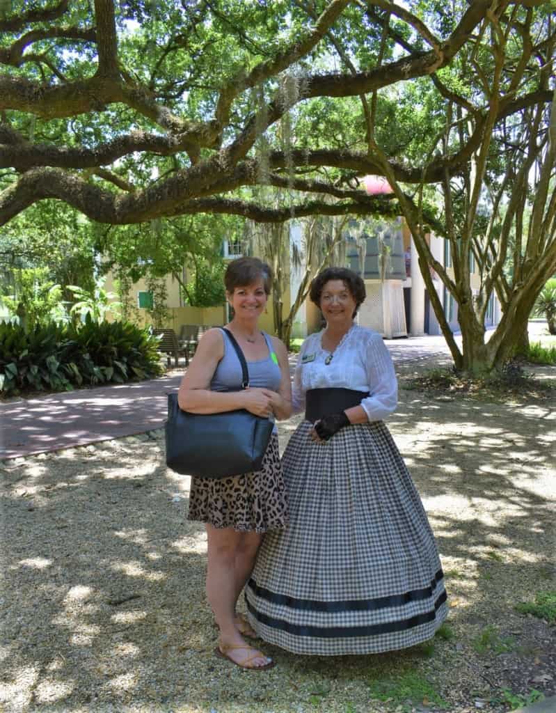 The author poses with a tour guide at Destrahan Plantation. 