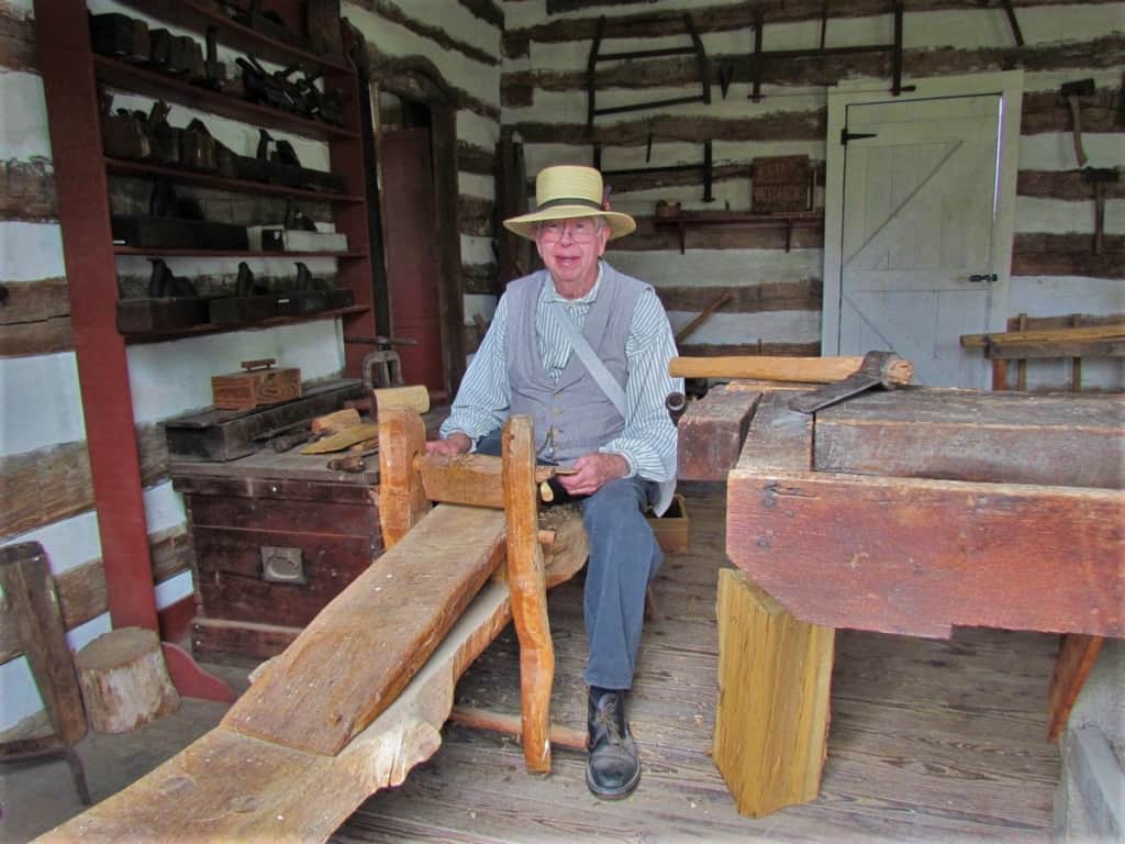 One of the volunteers at Missouri Town 1855 teaches visitors about life in the 1800s. 