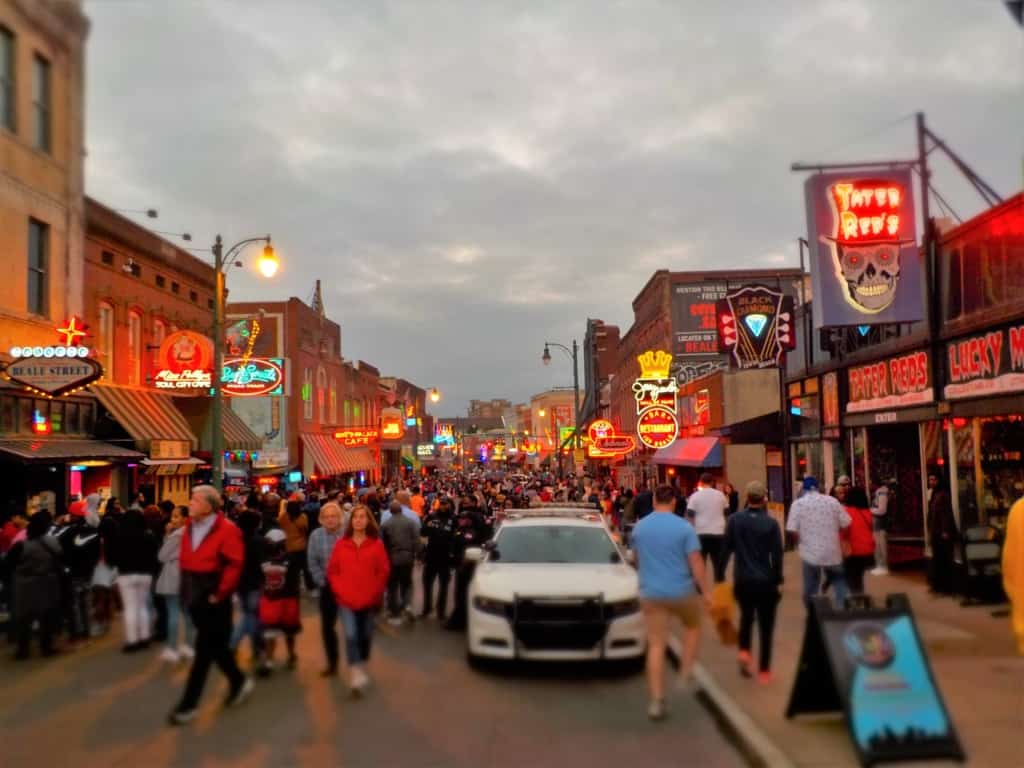 Even a pandemic can't stop the crowds from walking on Beale Street. 
