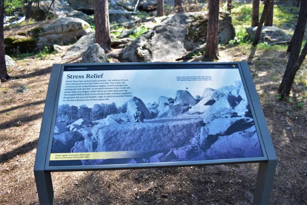 Signage around the base of the site help visitors gain an understanding of Devils Tower.
