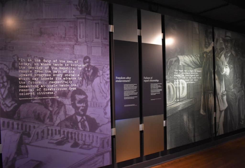 A display questions how America changed after the end of slavery. 