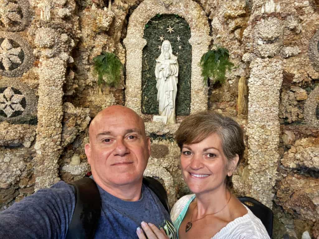 The authors pose for a selfie inside the Grotto of the Redemption. 