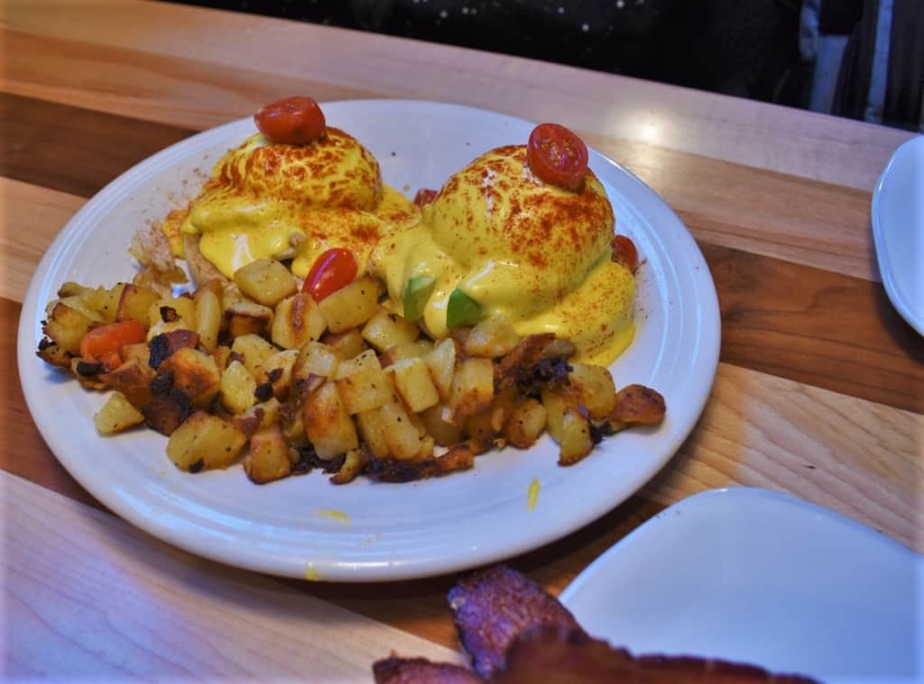 A colorful plate of Eggs Benedict from HomeGrown Kansas City. 