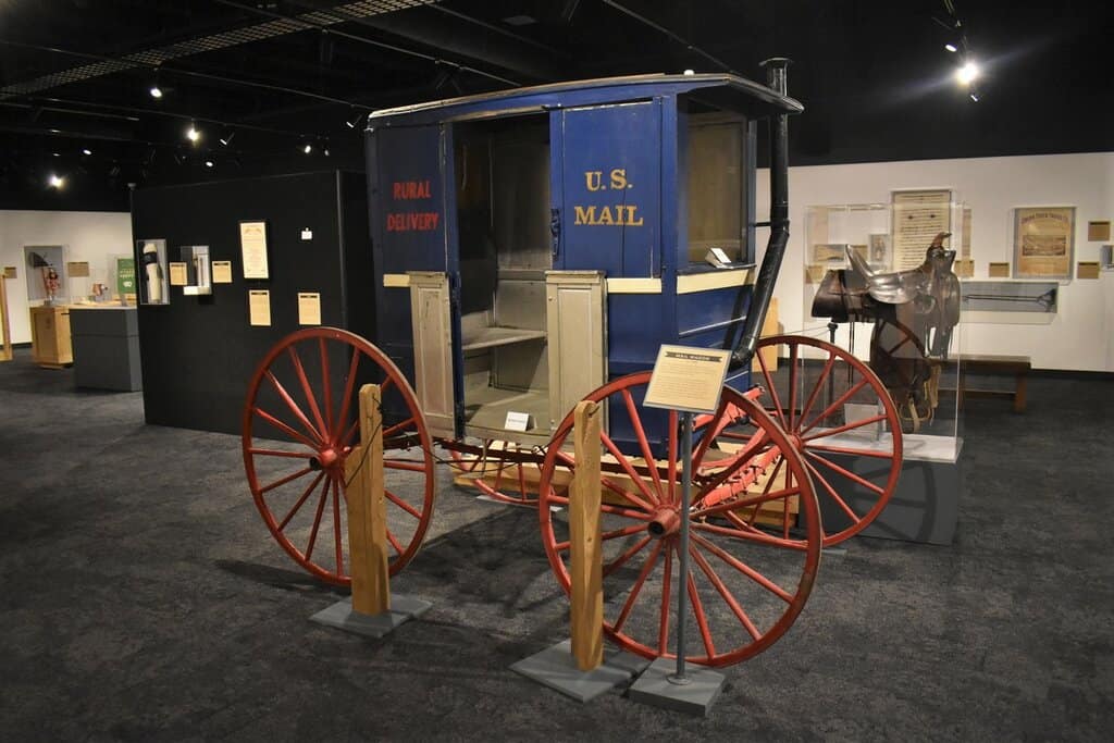 An exhibit at the Nebraska History Museum shows early postal delivery methods.