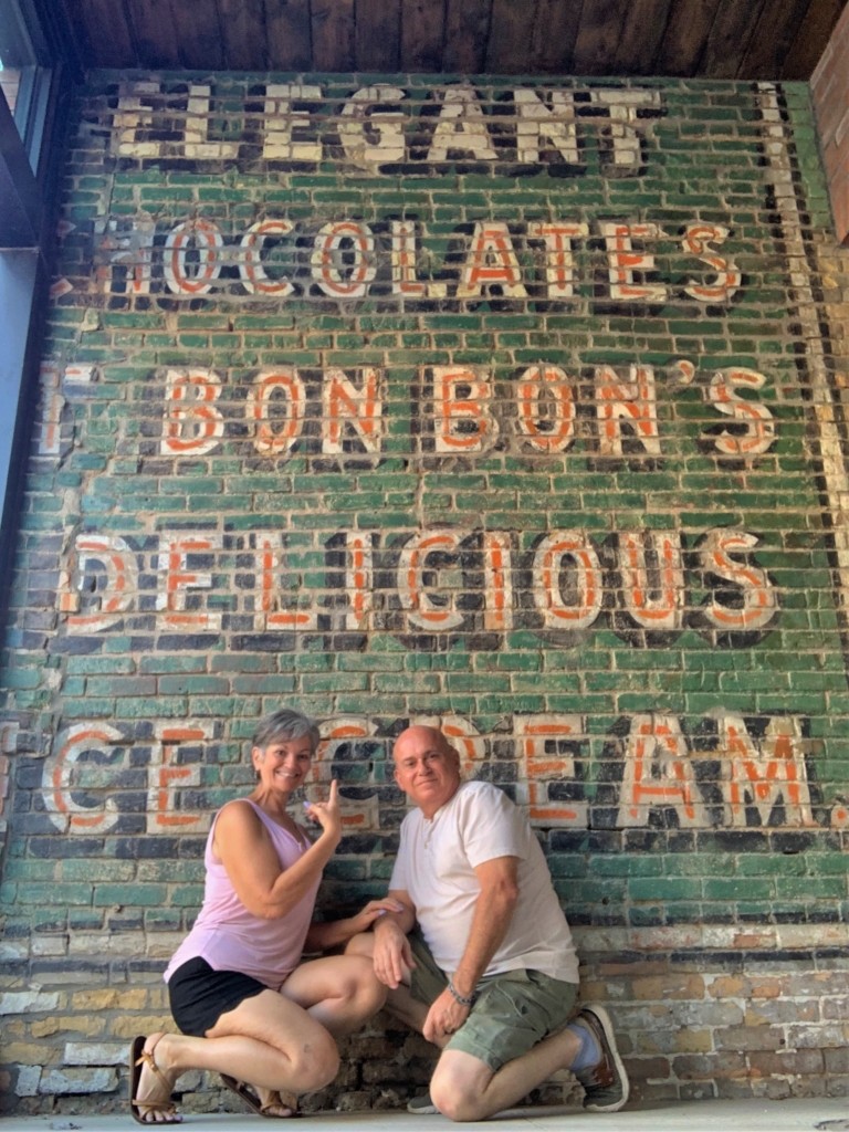 The authors pause for a photo while exploring downtown Salina, Kansas. 