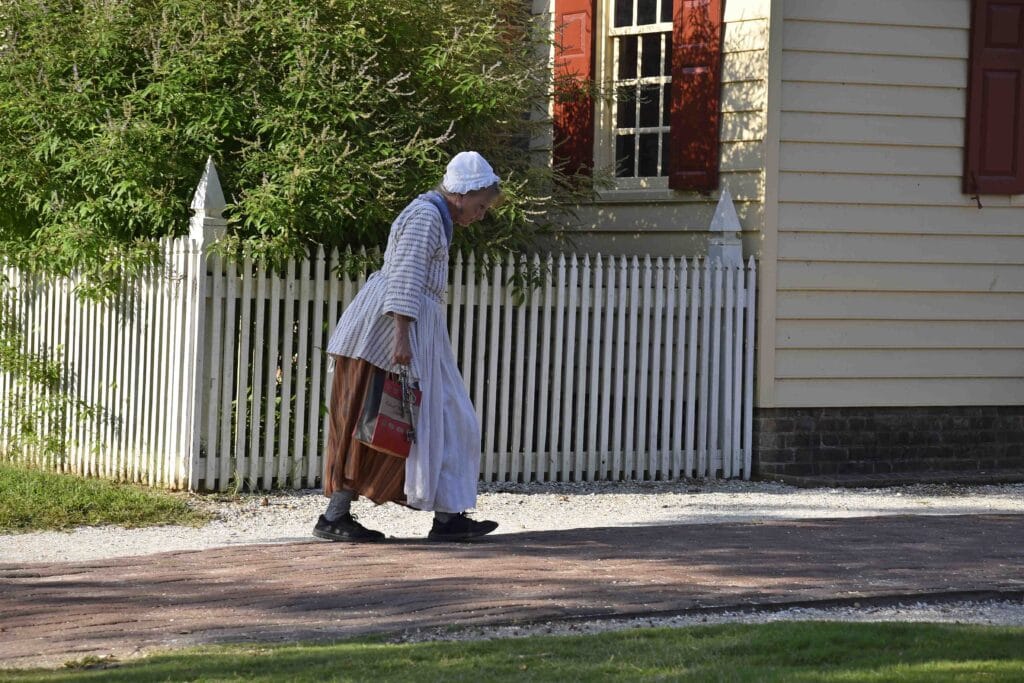 An interpreter heads home after a day at Colonial Williamsburg.
