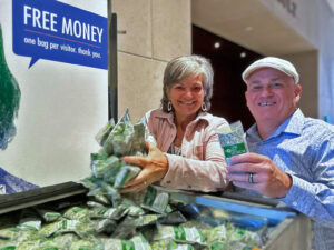 The authors get their hands on some of teh shredded currency available for a special momento.