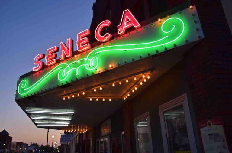 A lighted marquee about the Seneca movie theater.