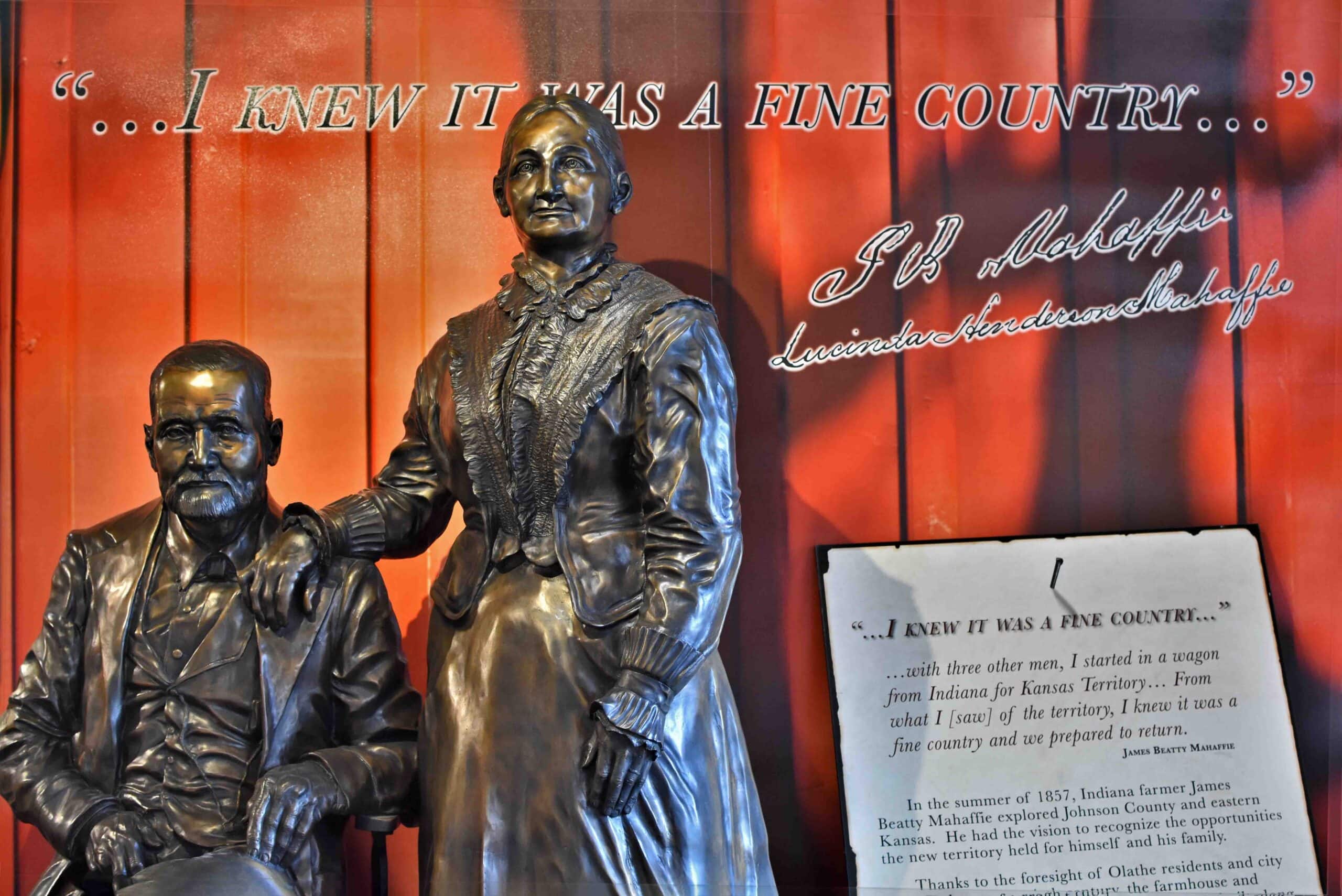 A statue of the Mahaffies welcomes visitors to the Mahaffie Stagecoach Stop.