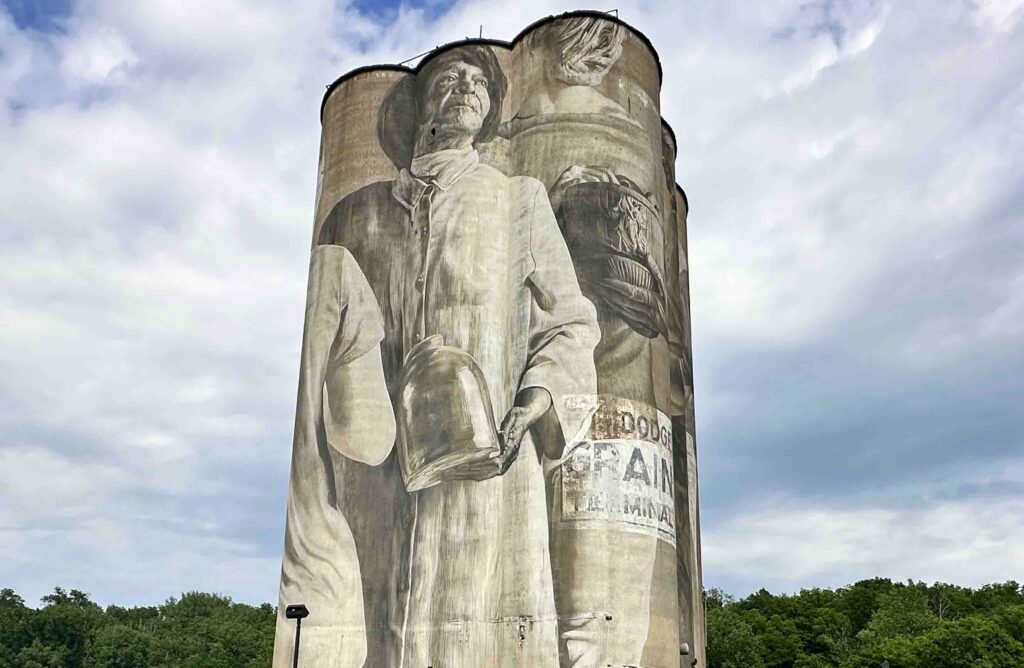 The Guido Van Helten mural stands tall above the Fort Dodge skyline.