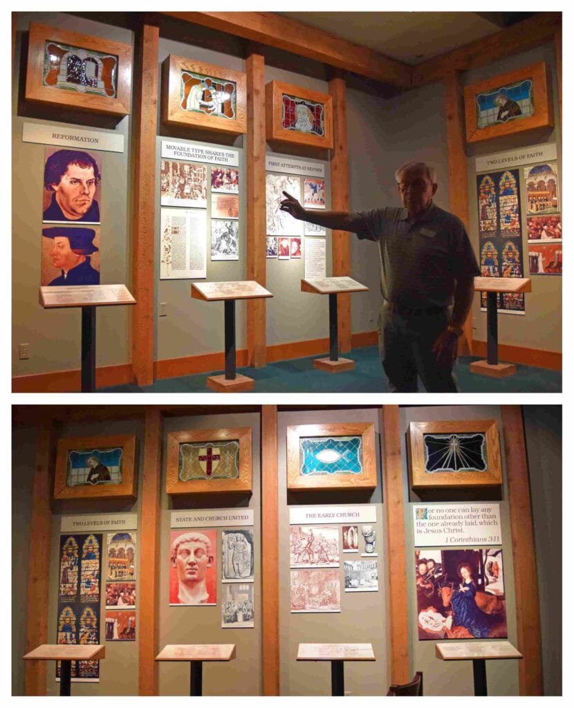 A museum volunteer walks through a presentation of the early church.