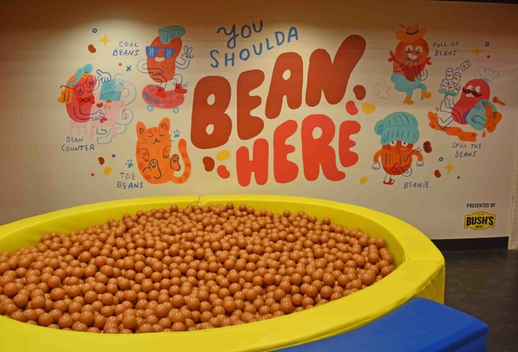 A ball pit is designed to replicate a bowl of BBQ beans.