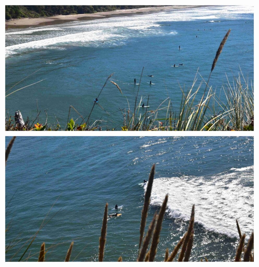 Surfers take turns catching waves.