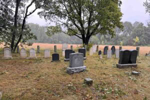 This graveyard holds stones and markers from people associated with the Salem Witch Trials.